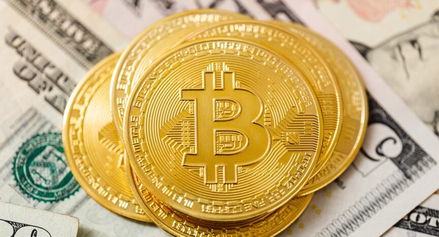 image représentant un jeton bitcoin et des billets